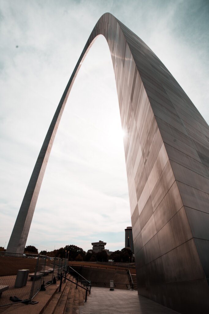 Looking up at the monumental St. Louis arch. 