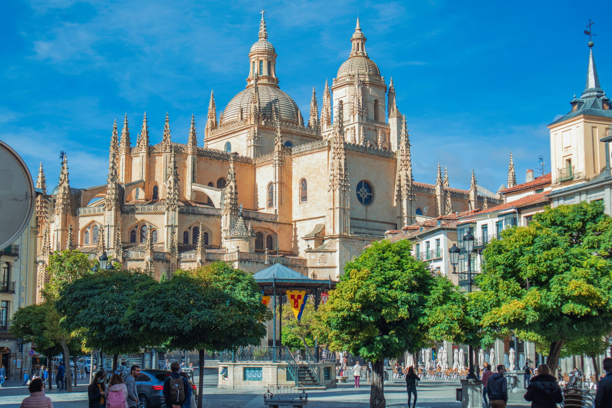 A city square in front of a large cathedral