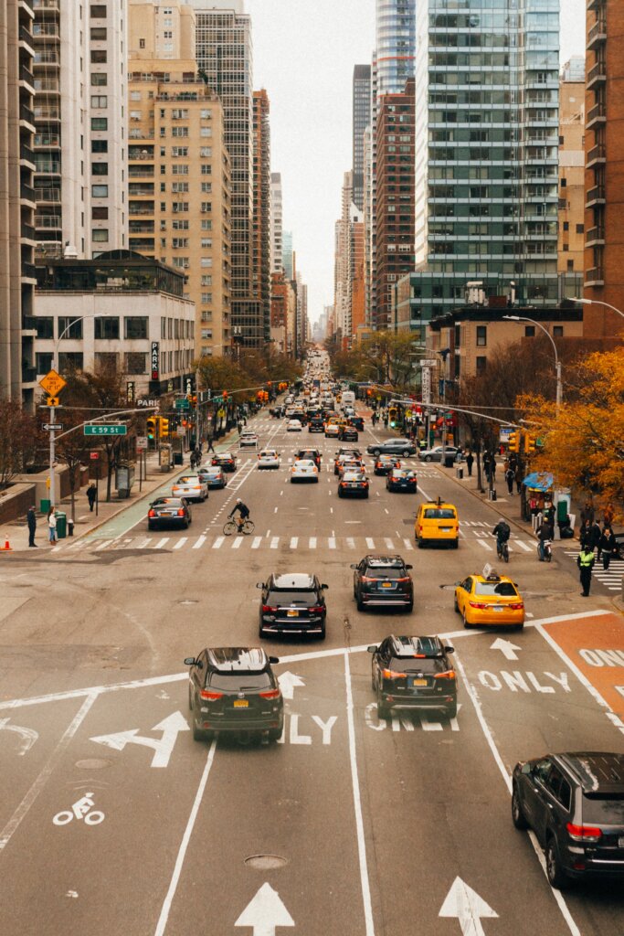 New York City traffic with iconic yellow taxicabs. 