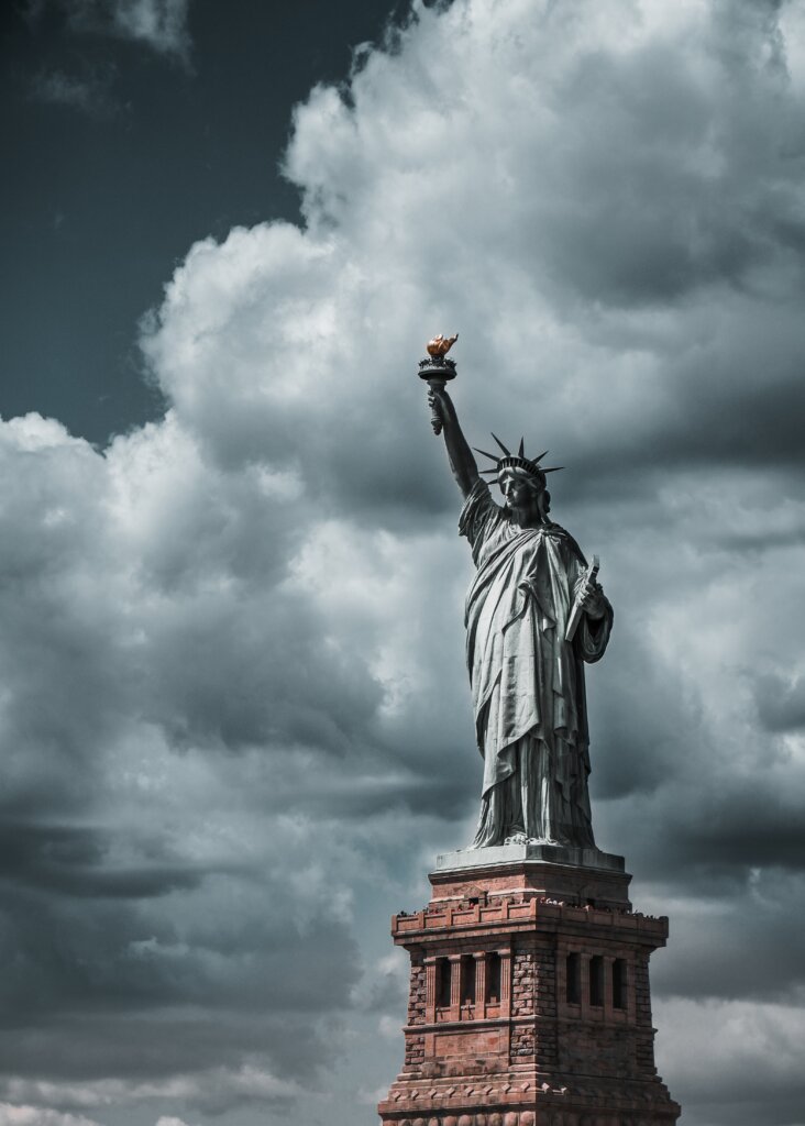 The Statue of Liberty on a cloudy day. 