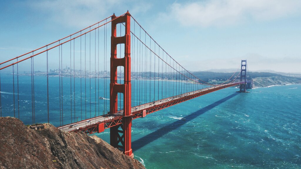 The Golden Gate Bridge in San Francisco on a blue sky day. 