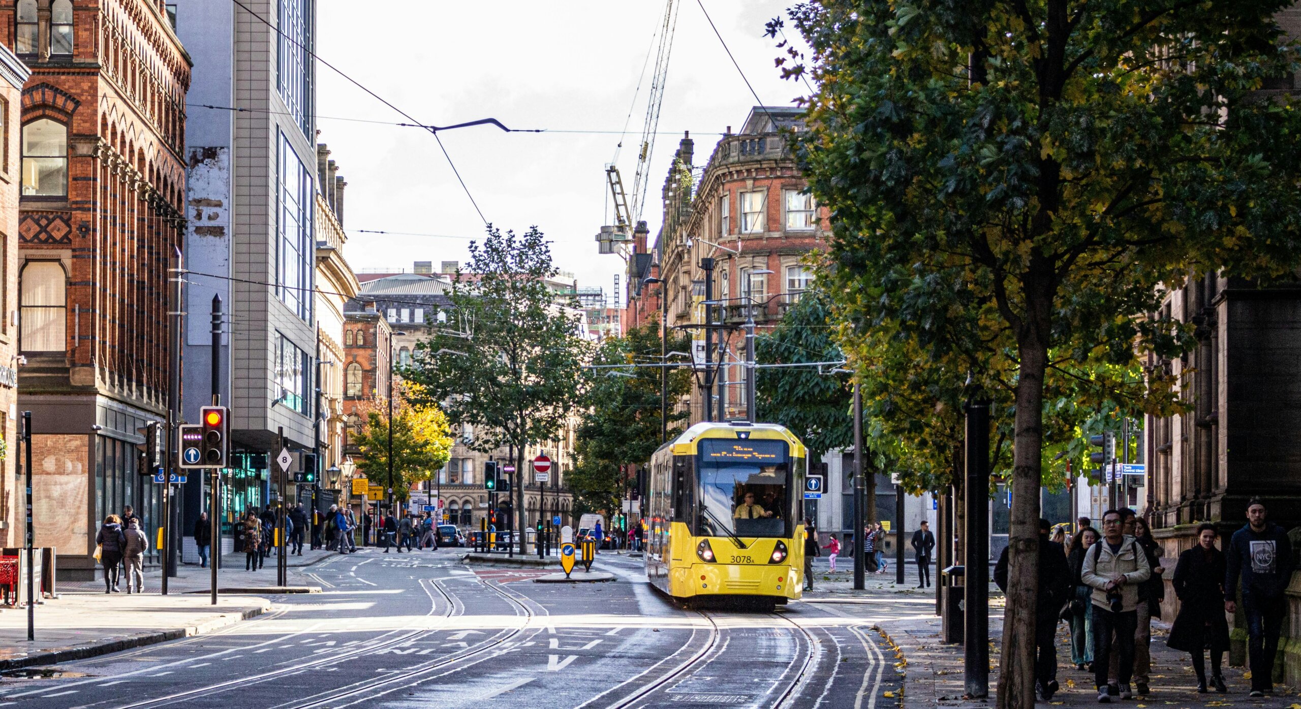 Yellow tram in Manchester city centre