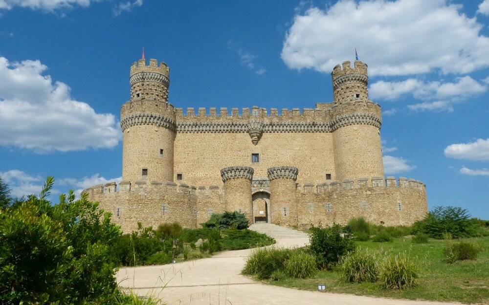 A castle with stone towers on a sunny day