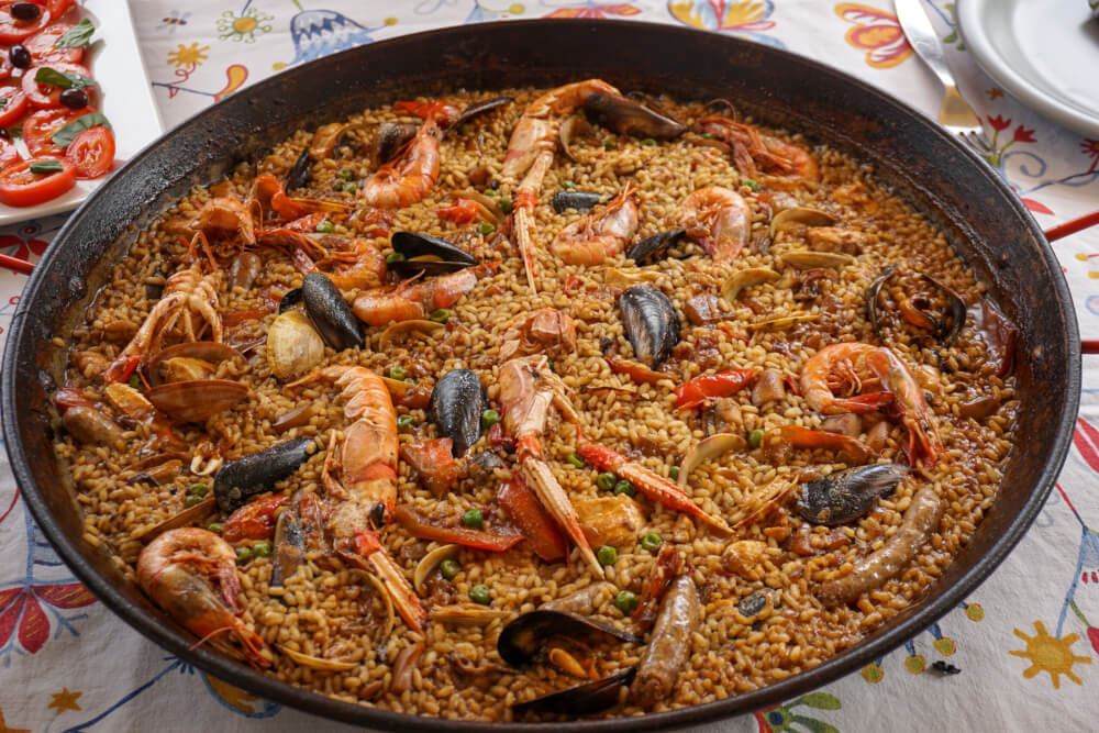 Seafood paella - rice with shirmp, pawns, mussels, and beans