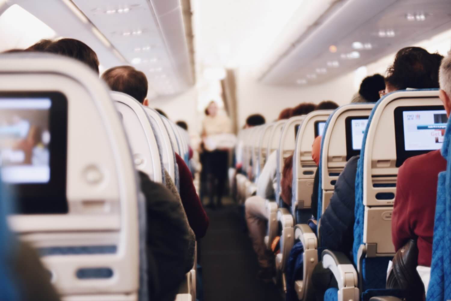 Airplane seats filled with passengers