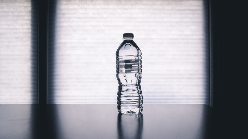 Water bottle on black table